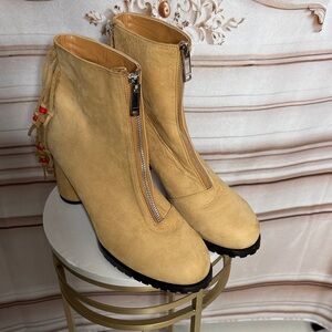 Stylish Tan Heeled Boots with Fringe